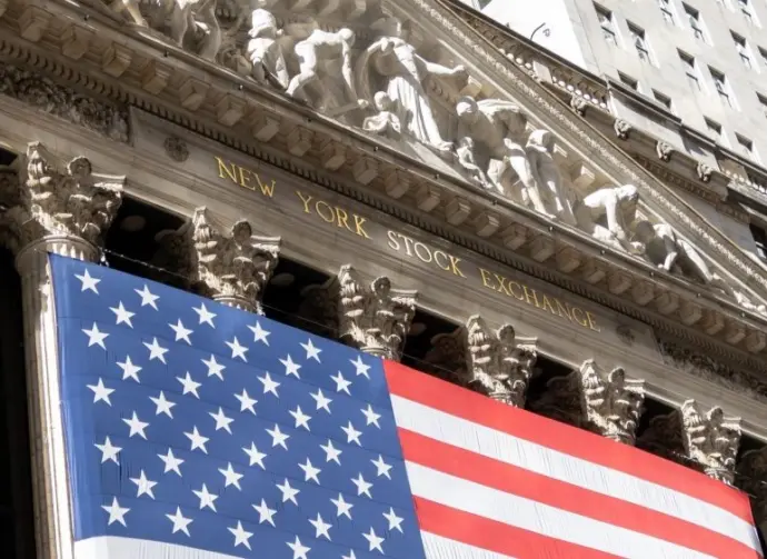 Grand American flag displayed on the facade of the New York Stock Exchange in downtown Manhattan. New York^ NY^ USA - 11.05.2024