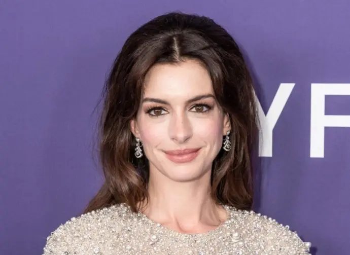 Anne Hathaway wearing dress and shoes by Valentino attends presentation of movie Armageddon Time during 60th New York Film Festival at Alice Tully Hall on October 12^ 2022