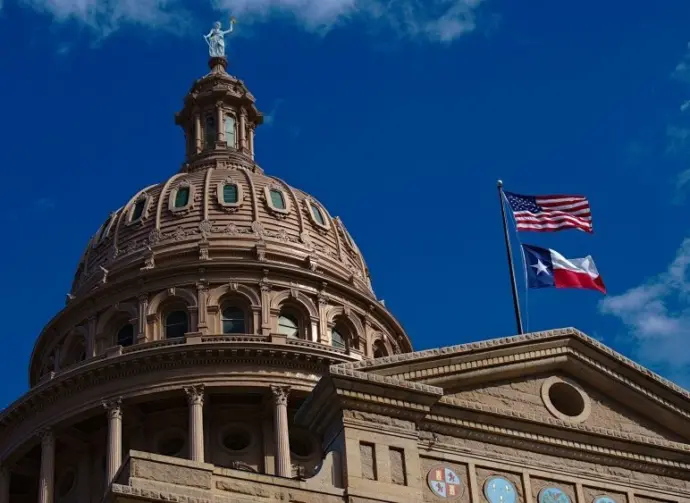 Texas State Capitol Building - The pink marble granite Texas Capitol building is located at the end of Congress Avenue in downtown Austin^ Texas.