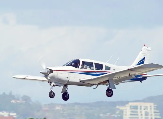 Piper PA-28R-200 fixed wing single engine aircraft approaching runway for a landing at Santa Monica Airport in Los Angeles^ California USA SANTA MONICA/CALIFORNIA - MARCH 6^ 2016