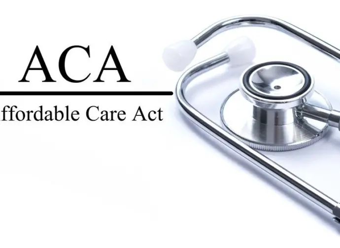Page with ACA (Affordable Care Act) on the table with stethoscope^ medical concept