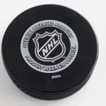 Officiel licensed hockey puck for NHL^ National hockey league. MOTALA^ SWEDEN- 10 MARCH 2021
