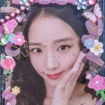 Photocard of girl group singer Kim Ji Soo or Jisoo of Blackpink. photocard of Jisoo blackpink isolated on blue background.