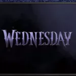 TV on black wall. TV screen playing Wednesday trailer or movie. Moscow^ Russia - December 5^ 2022.