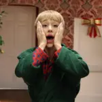 ariana-grande-snl-home-alone-dec-20-2025-billboard-1800417175