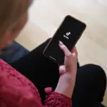 woman-watching-tiktok-billboard-1800987222