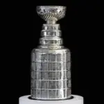 NHL ceremony - Stanley Cup trophy on the white stand^ black background^ Vancouver BC - October 22^ 2018