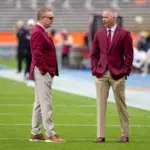 Florida State Seminoles head coach Mike Norvell Florida State Seminoles Athletic Director Michael Alford at Ben Hill Griffin Stadium. Gainesville^ Florida USA - November 29^ 2025