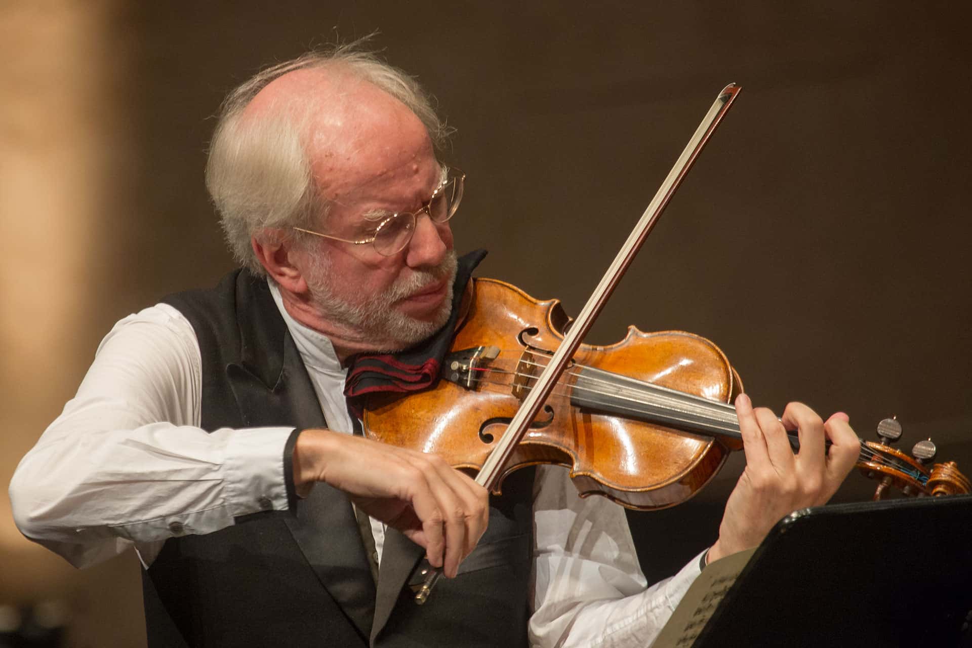 Man plays a violin