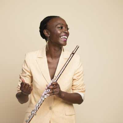 Portrait of woman holding flute