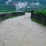 KATHMANDU^ NEPAL - July 06^ 2024: Due to heavy rainfall^ the Nakhu River flood in Kathmandu.