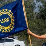 Members of the United Auto Workers (UAW) Local 2250 picket outside of the General Motors (GM) Auto Assembly Plant as part of nation-wide labor strikes. WENTZVILLE^ MISSOURI - September 30^ 2023