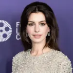 Anne Hathaway wearing dress and shoes by Valentino attends presentation of movie Armageddon Time during 60th New York Film Festival at Alice Tully Hall on October 12^ 2022