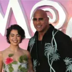 Auli'i Cravalho and Dwayne Johnson attend the "Moana 2" UK Premiere at Cineworld Leicester Square in London^ England.