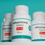 Mifepristone tablets in bottle. RU-486 Medical abortion pills. Used in combination with misoprostol. 3D illustration.