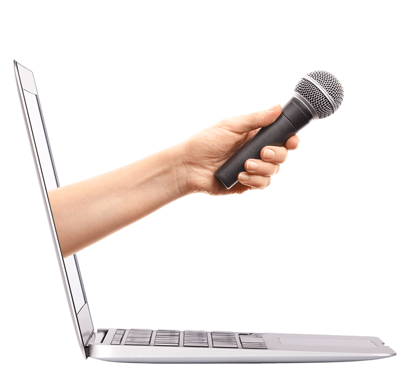 hand holding mic coming from laptop