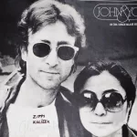 The Lennon Wall since the 1980s is filled with John Lennon-inspired graffiti and pieces of lyrics from Beatles. PRAGUE^ CZECH REPUBLIC - DECEMBER 15