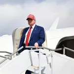 U.S. President Donald Trump arrives at Morristown Airport^ New Jersey^ on June 20^ 2025^ stepping off Air Force One en route to his Bedminster golf resort for a MAGA Inc. fundraising dinner.