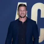 Alan Ritchson at the 2022 Academy of Country Music Awards Arrivals at Allegient Stadium on March 7^ 2022 in Las Vegas^ NV