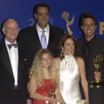 'Everybody Loves Raymond' stars PETER BOYLE (left)^ BRAD GARRETT^ MADYLIN SWEETEN^ PATRICIA HEATON & RAY ROMANO at the 55th Annual Emmy Awards in Los Angeles. Sept 21^ 2003