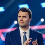 Charlie Kirk clapping hosting his 'Charlie Kirk Show'. Los angels^ United states . — SEPTEMBER 11^ 2025