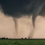 A pair of tornadoes take a destructive path through northern Oklahoma farmyards near Cherokee