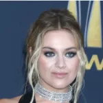 Kelsea Ballerini at the 2022 Academy of Country Music Awards Arrivals at Allegient Stadium on March 7^ 2022 in Las Vegas^ NV