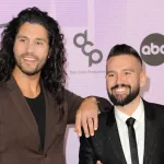 Dan Smyers and Shay Mooney of Dan + Shay at the 2022 American Music Awards held at the Microsoft Theater in Los Angeles^ USA on November 20^ 2022.