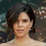 Neve Campbell wearing dress by Barney Cheng Couture attends the premiere of Skyscraper at AMC Loews Lincoln Center New York^ NY - July 10^ 2018