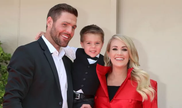 Mike Fisher^ Isaiah Fisher^ Carrie Underwood at the Carrie Underwood Star Ceremony on the Hollywood Walk of Fame on September 20^ 2018 in Los Angeles^ CA