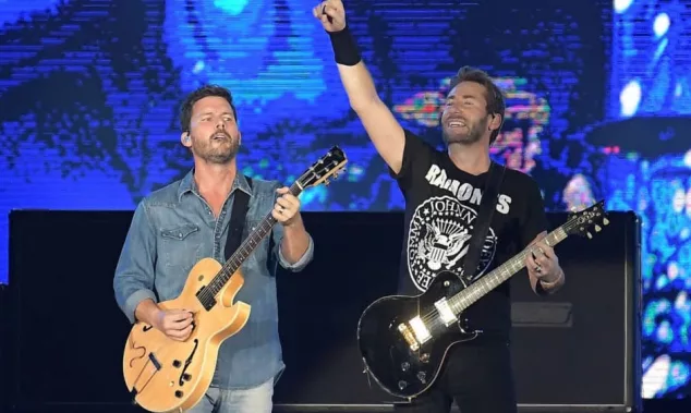 Guitarists Chad Kroeger and Ryan Peake of Canadian rock band Nickelback during a concert at Rock in Rio 2019 in Rio de Janeiro.