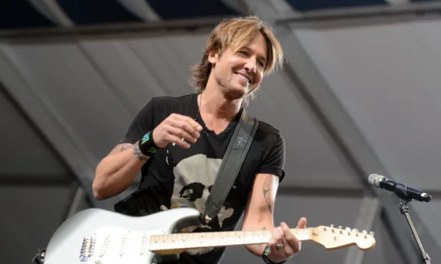 Keith Urban performs at the 2015 New Orleans Jazz and Heritage Festival. New Orleans^ LA - April 24^ 2015