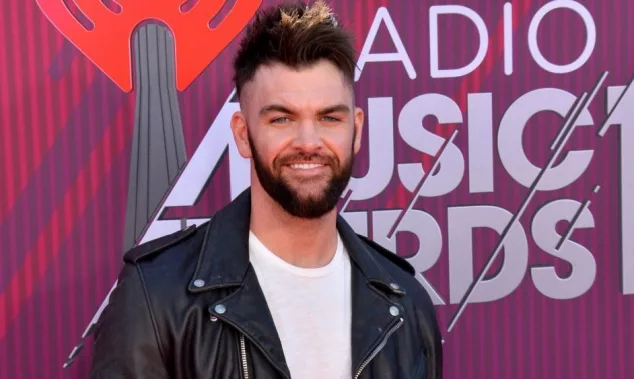 Dylan Scott at the 2019 iHeartRadio Music Awards at the Microsoft Theatre. LOS ANGELES^ CA. March 14^ 2019
