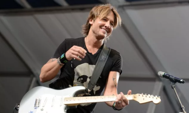 Keith Urban performs at the 2015 New Orleans Jazz and Heritage Festival. New Orleans^ LA - April 24^ 2015