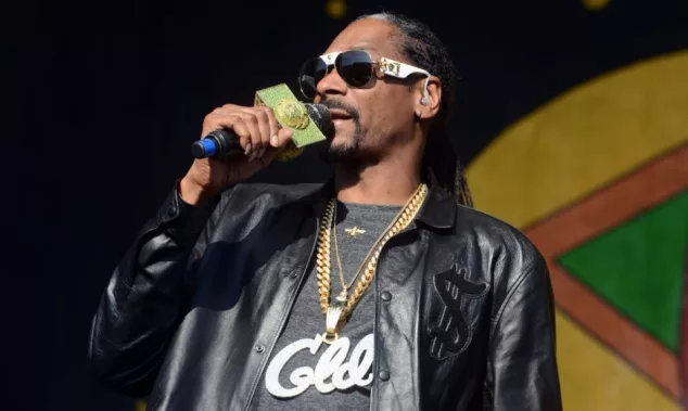 Snoop Dogg performs at the 2017 New Orleans Jazz and Heritage Festival. New Orleans^ Louisiana - April 28^ 2017