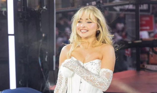 Sabrina Carpenter performs on stage during 2024 New Year's celebration on Times Square in New York on December 31^ 2023.