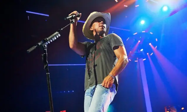 Kenny Chesney performs at the inaugural iHeartRadio Music Festival at the MGM Grand Garden Arena. Las Vegas^ NV^ USA: September 24^ 2011