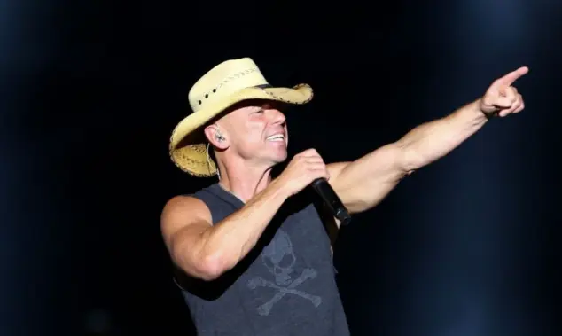 Singer Kenny Chesney performs onstage at the Runaway Country Music Fest at Osceola Heritage Park on March 19^ 2016 in Kissimmee^ Florida.