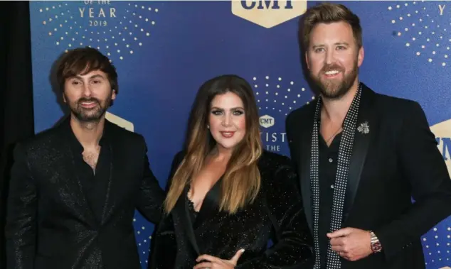 (L-R) Dave Haywood^ Hillary Scott and Charles Kelley of Lady A attend the 2019 CMT Artists of the Year at Schermerhorn Symphony Center on October 16^ 2019 in Nashville