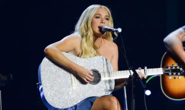 Megan Moroney performs in Hollywood^ Florida on November 14^ 2024 as part of Audacy’s Stars and Strings benefit concert.