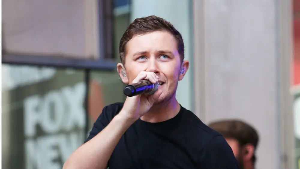 Scotty McCreery performs onstage at Fox and Friends' All-American Summer Concert Series at 48th Street and 6th Avenue on July 31^ 2015 in New York City.