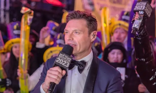 Ryan Seacrest is seen in Times Square during a New Year's Eve broadcast. NEW YORK^ N.Y. – December 31^ 2022