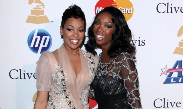 Monica^ Brandy Norwood arrives at the 2011 Pre-GRAMMY Gala And Salute To Industry Icons at Beverly Hilton Hotel on February 12^ 2011 in Beverly Hills^ CA