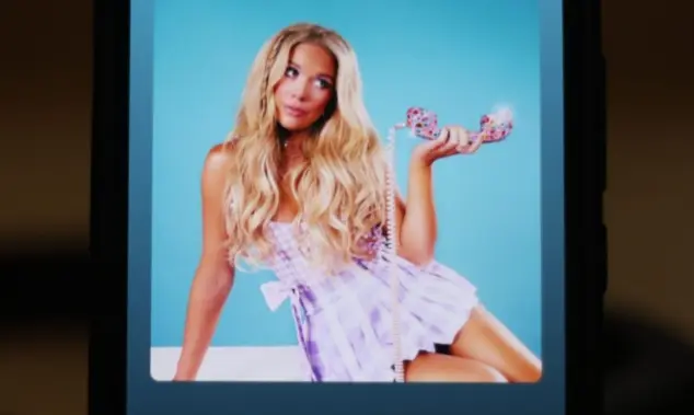 Image shows the album cover and Spotify playback screen displayed on a phone for the song "6 Months Later" by country music artist Megan Moroney.