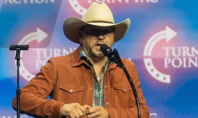 Jason Aldean speaks at a Donald Trump election rally at the Gas South Arena in Duluth^ Georgia. Duluth^ Georgia^ October 23^ 2024
