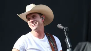 Country recording artist Dustin Lynch performs during the 'Kick The Dust Up' Tour at Vanderbilt Stadium on July 11^ 2015 in Nashville^ Tennessee.