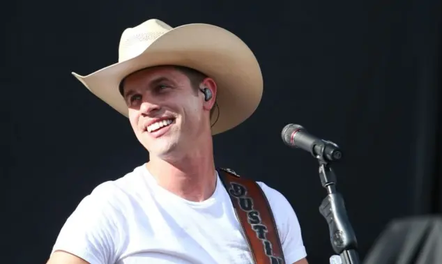 Country recording artist Dustin Lynch performs during the 'Kick The Dust Up' Tour at Vanderbilt Stadium on July 11^ 2015 in Nashville^ Tennessee.