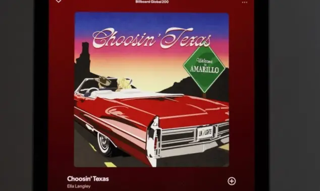 Apple iPad displays the Spotify music streaming application^ which is playing the song "Choosin' Texas" by the artist Ella Langley.