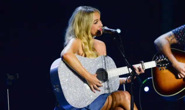 Megan Moroney performs in Hollywood^ Florida on November 14^ 2024 as part of Audacy’s Stars and Strings benefit concert.