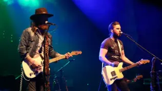 NEW YORK-MAY 6: Singers T.J. Osborne (R) and John Osborne of Brothers Osborne perform onstage at the Paramount on May 6^ 2016 in Huntington^ New York.